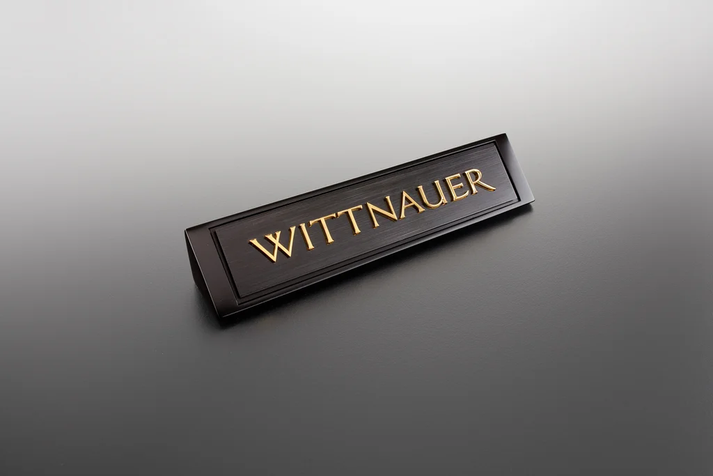Wittnauer: Counter nameplate sign produced by Casadevall Group.