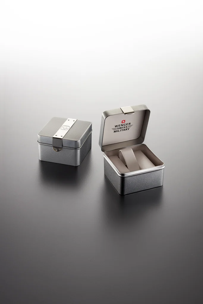 Wegner Swiss: Metal tin watch case produced by Casadevall Group.
